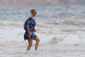 Jenny McCarthy, blue dress, blue beach cover up, Hawaii, ponytail, sunglasses, floral print dress